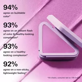 Prada touch blush in shade P36 Wisteria Claims with deep skin Model on a purple background
