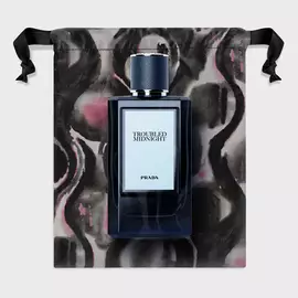 Prada Olfactories Troubled Midnight Eau de Parfum Packshot with Pouch on a neutral gray background 