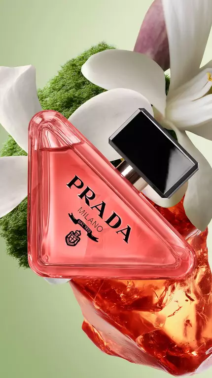Prada Paradoxe Intense EDP Pack with ingredients on a green background