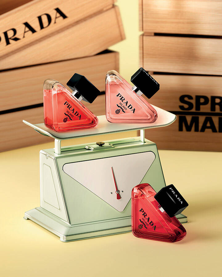 Prada Paradoxe Family with eau de parfum, Intense and Radical Essence in Spring Market with yellow background