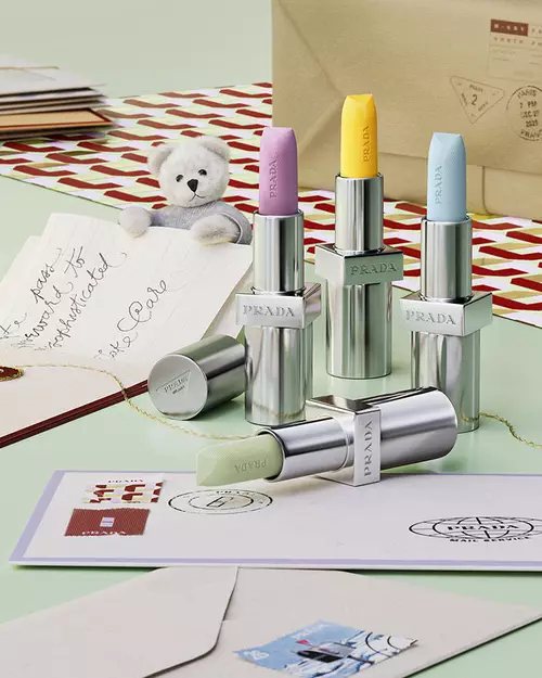 Prada Touch Blush in a holiday environment with letters, teddy bear and light green background
