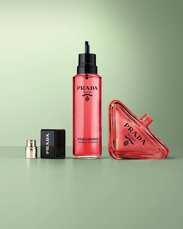 Prada Paradoxe Radical Essence - Pack with Refill on a Green Background