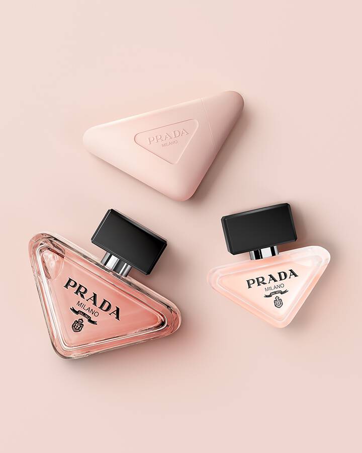 Prada Paradoxe Franchise with Eau De Parfum, Hair Mist and Hand Cream on a light pink background