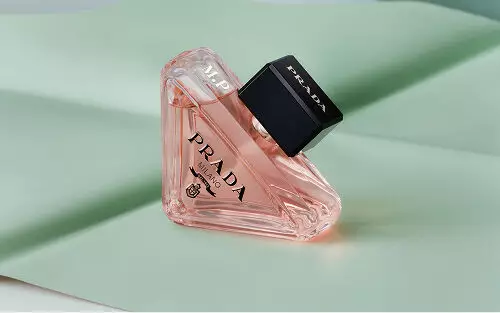 Prada Beauty Engraving Paradoxe Eau De Parfum on textured green background