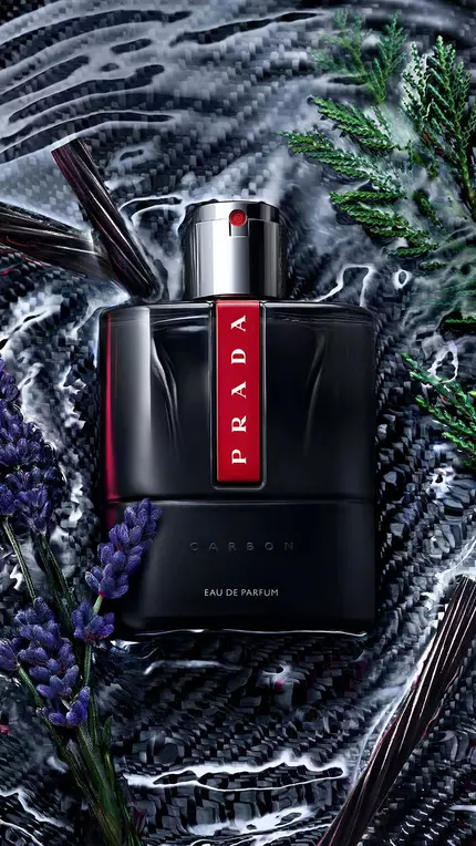 Prada Luna Rossa Carbon EDP Pack with ingredients on a watery background