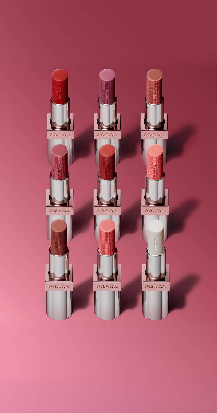 Prada Light Glowing Lipcolor on a pink background