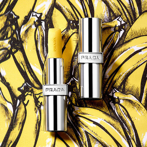 Prada Balm U002 package on iconic Prada banana print