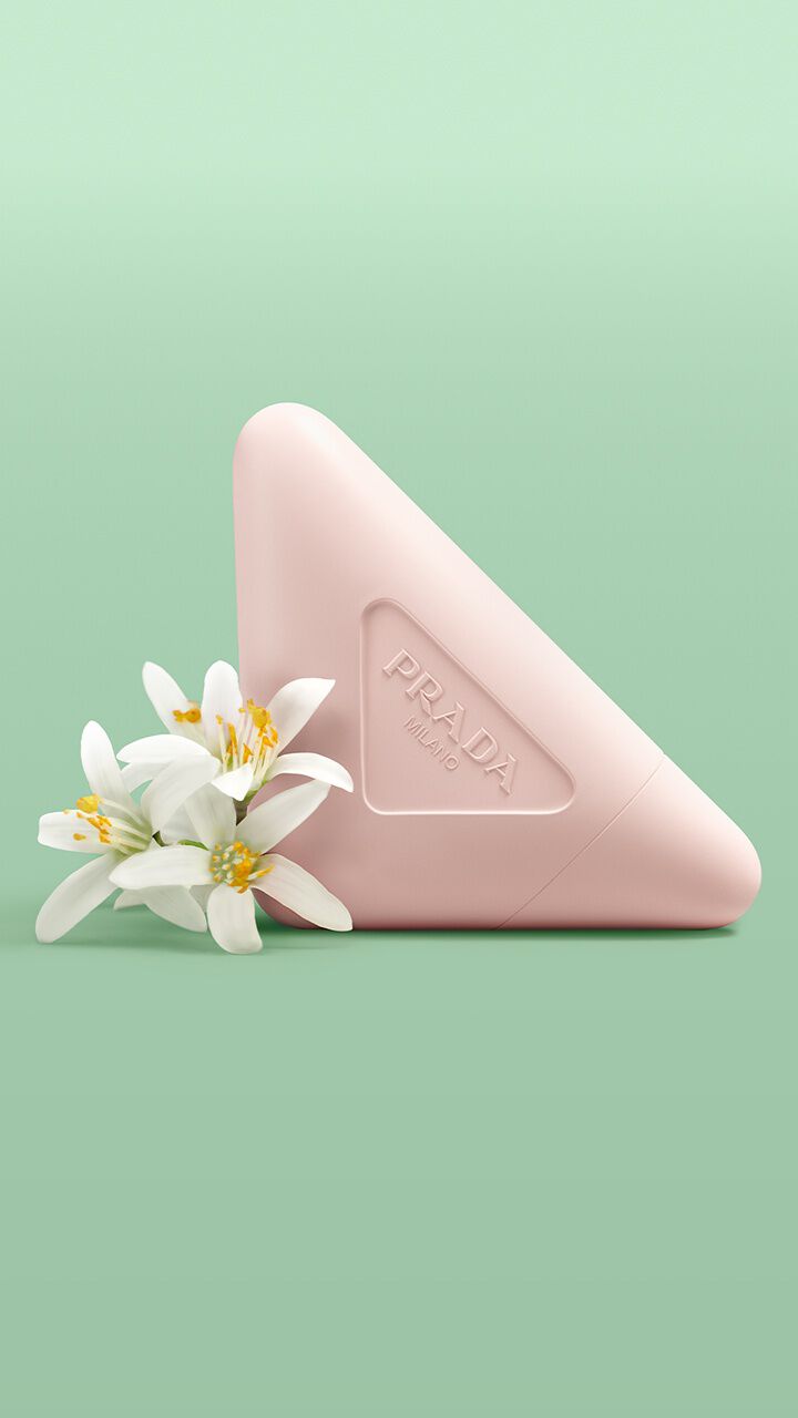 Prada Paradoxe Hand Cream with Bergamot Scent on a green background