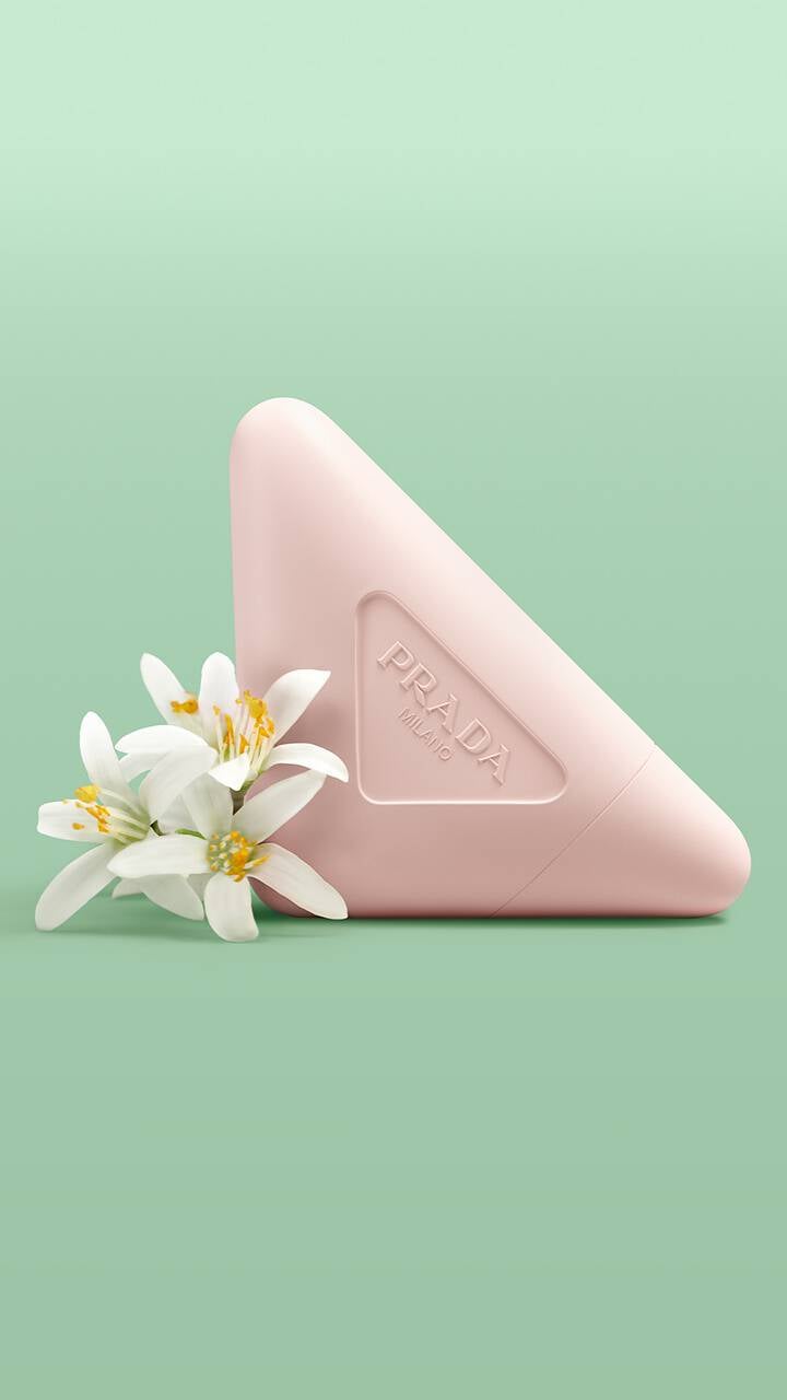 Prada Paradoxe Hand Cream with Bergamot Scent on a green background