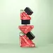 Three bottles of Prada Paradoxe Intense Eau De Parfum bottles stacked on top of each other