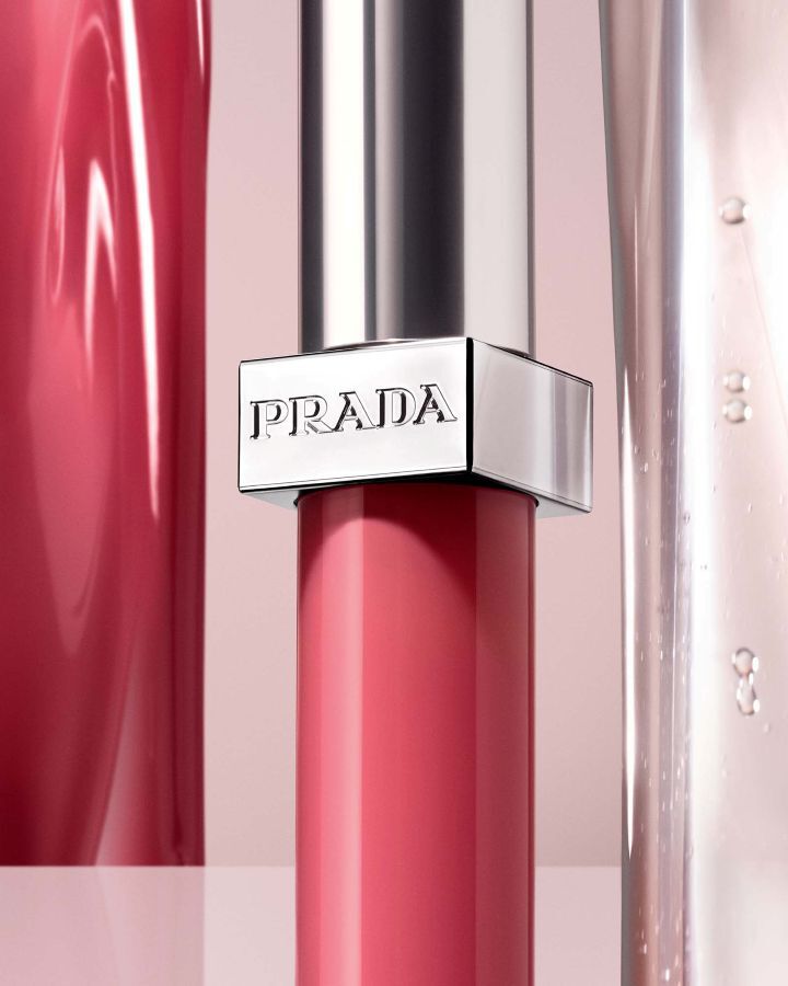 Prada Reflection Glossy Liquid Balm in a pink shade.