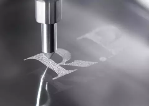 Engraving pen engraving letters "R.P."