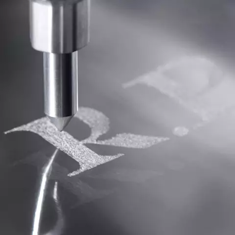 Engraving pen engraving letters "R.P."