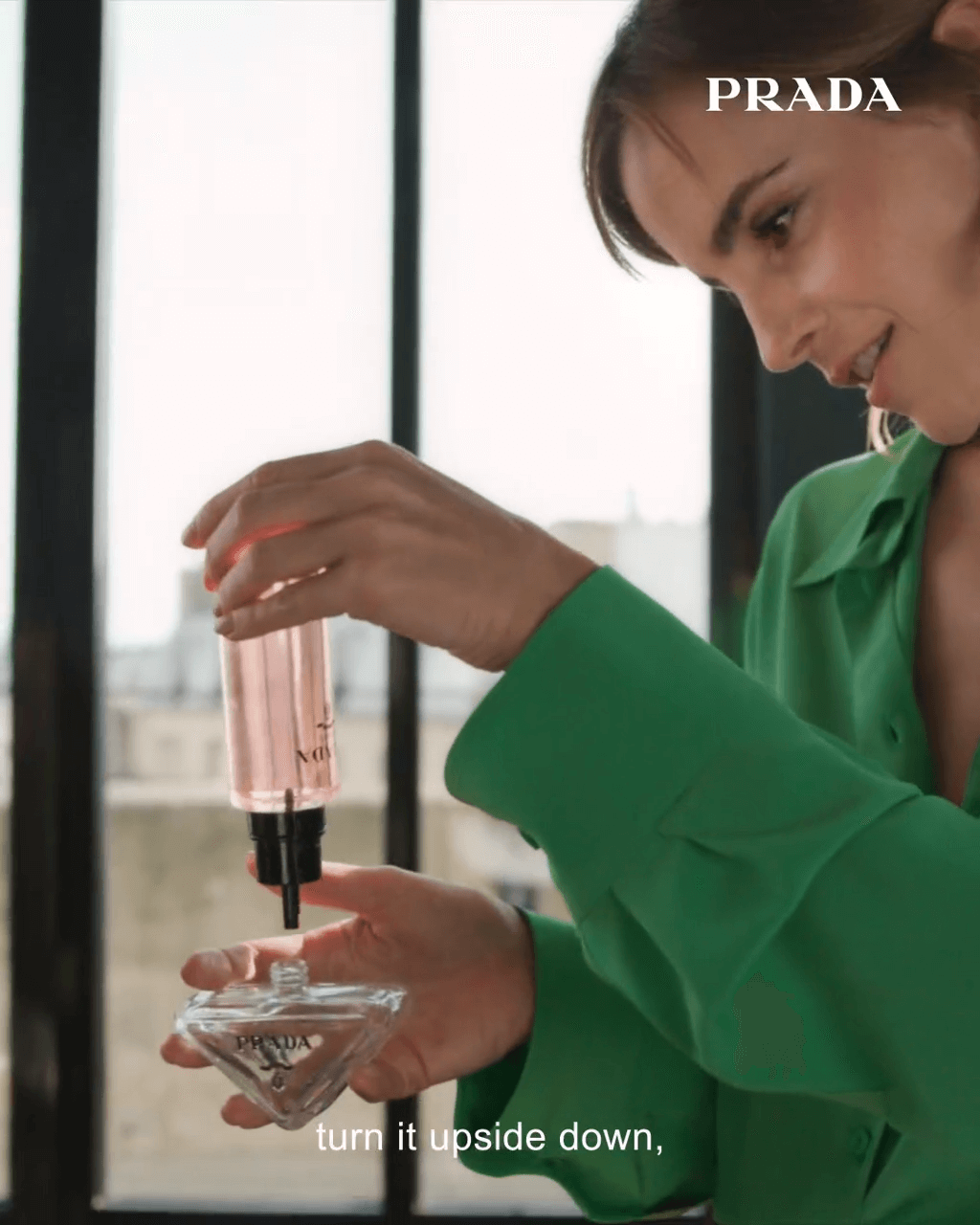 Emma Watson refilling her Paradoxe fragrance