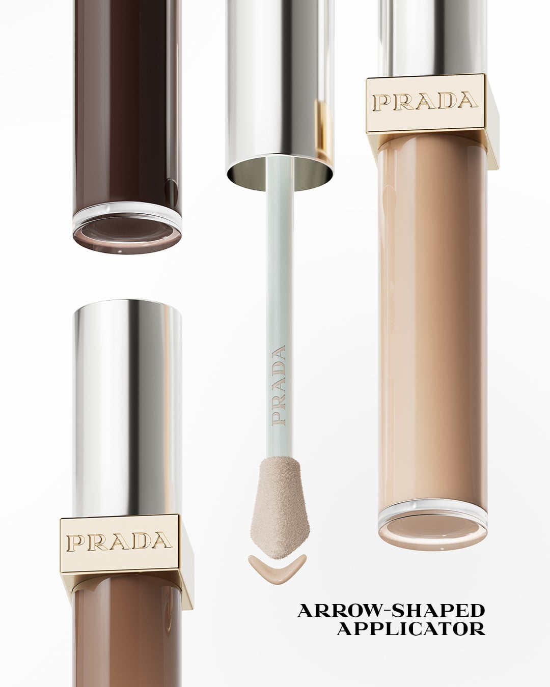 Three Prada Conceal packs in different shades, and the concealer’s arrow-shaped applicator.