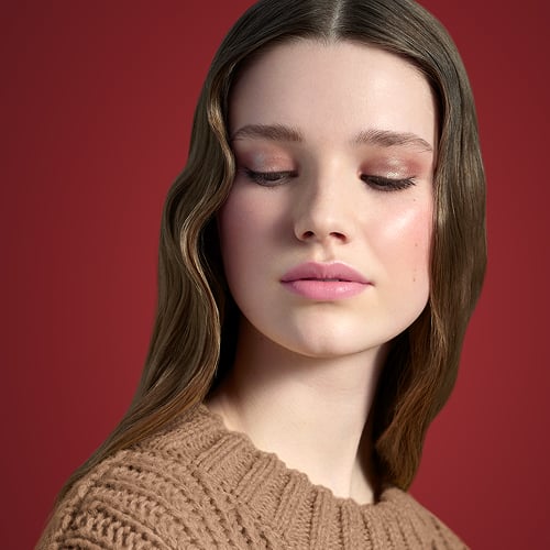 Prada Beauty Holiday Beauty Look - Light Skin Model (Verlee) on a red background